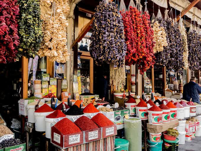 Interior of a spice bazaar in Gaziantep, Turkey, showing colorful displays of spices and market goods