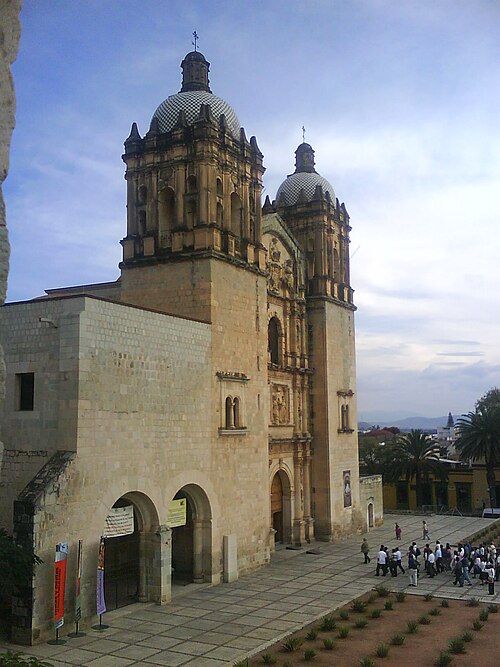 The facade of Santo Domingo de Guzmán church in Oaxaca, built from green cantera stone