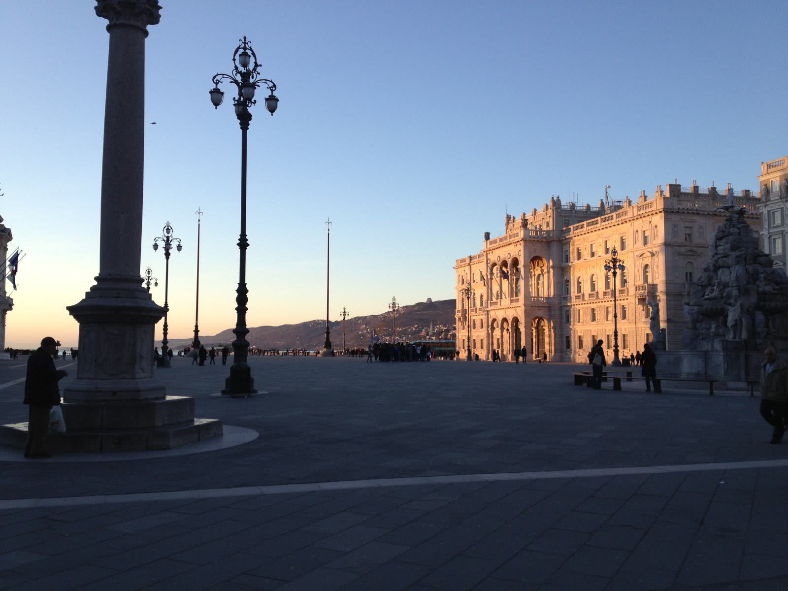 Piazza Unità d'Italia in Trieste at sunset, the square opening onto the Adriatic